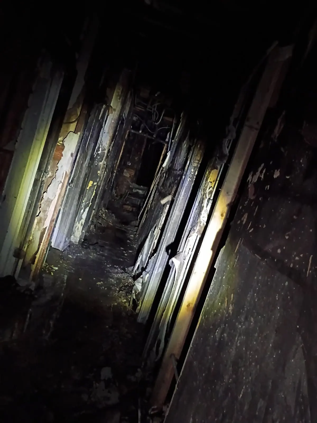 Second view of the charred hallway