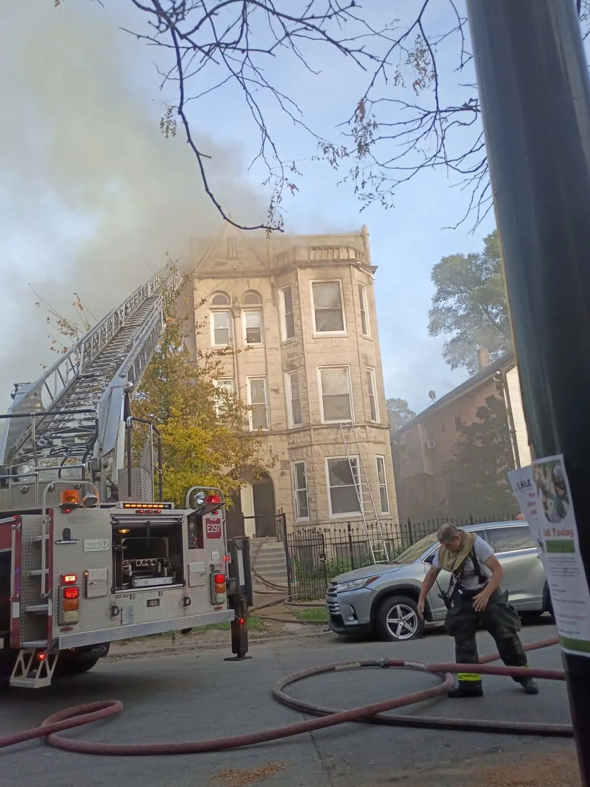 Fire truck and ladder at the building during the response