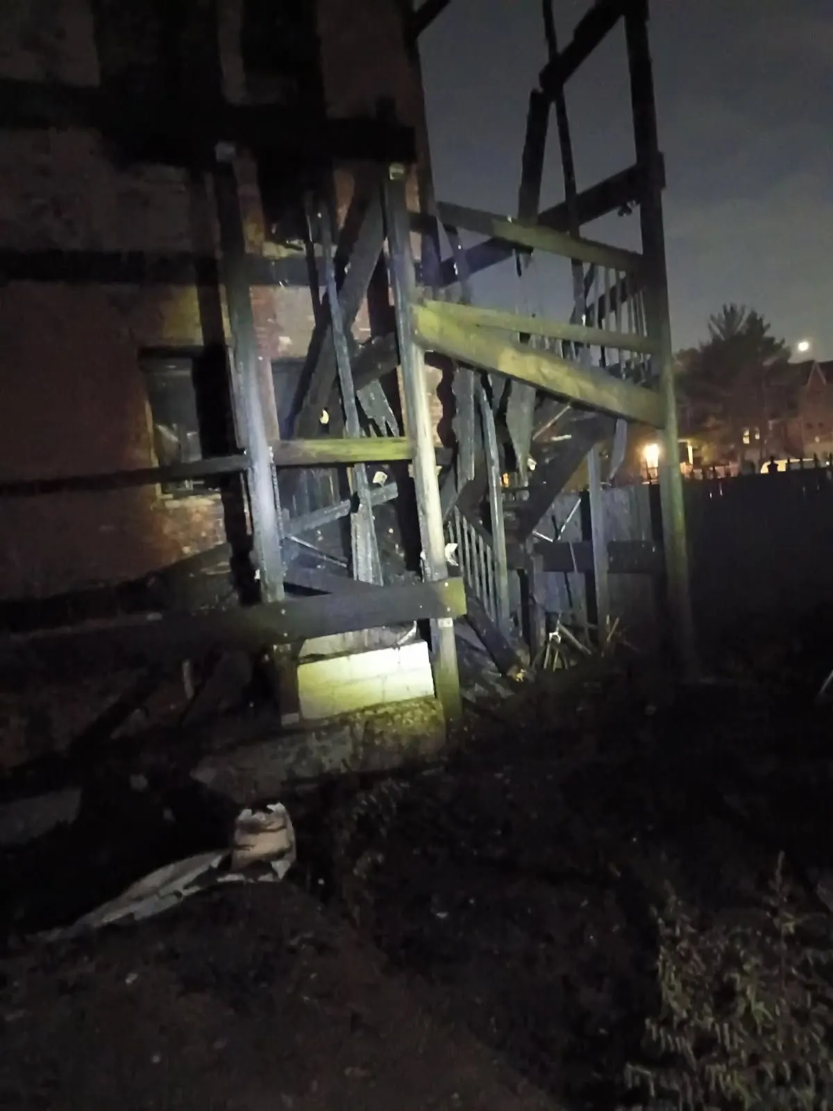 The porch area at night after the fire